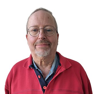 © Werner Hülsmann / Privat/Non-kommerziell Porträt Werner Hülsmann vor weißem Hintergrund